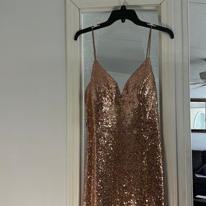 Rose gold sequin evening gown with slit on side